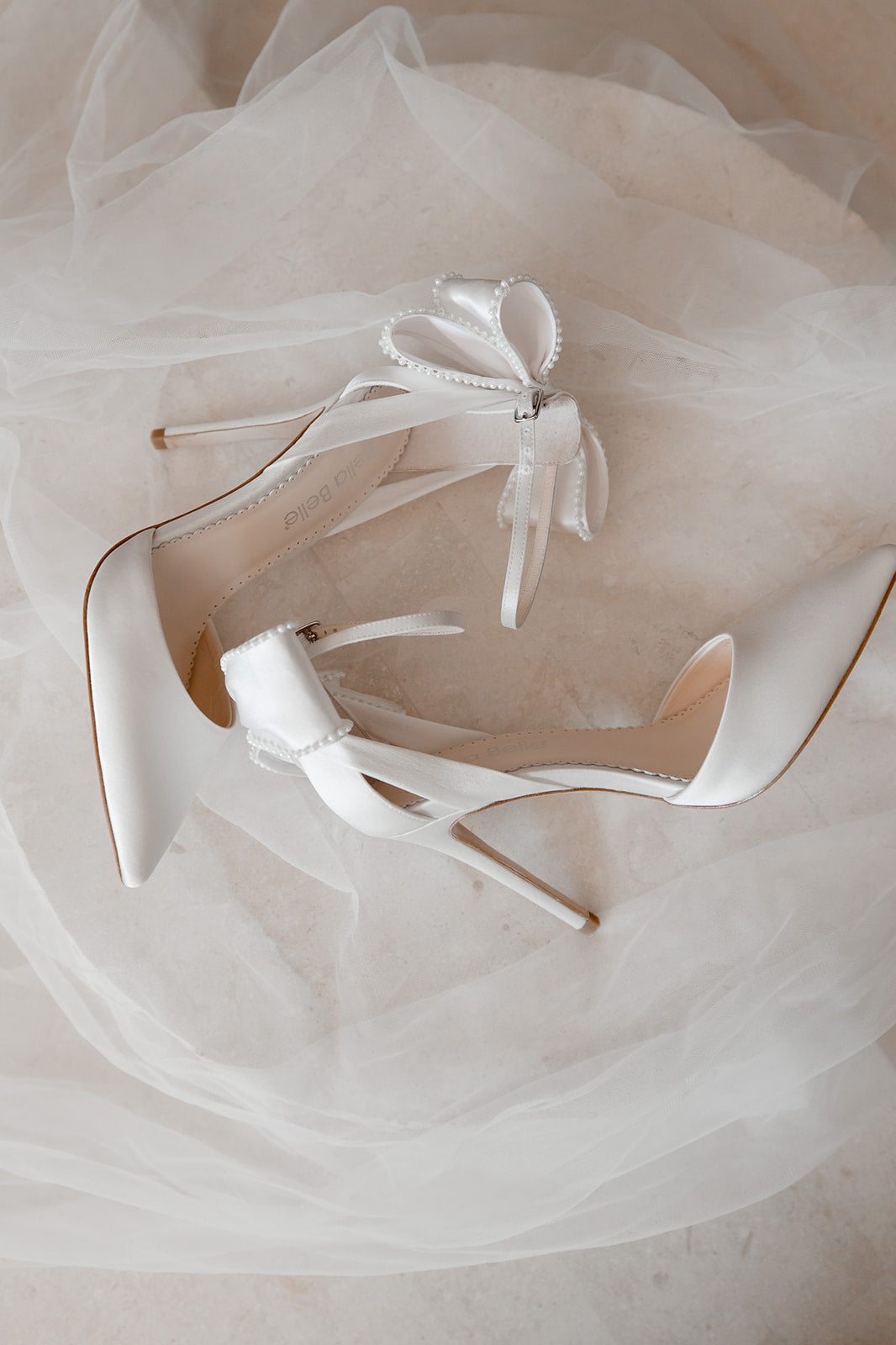 Buy Mirabelle - Ivory Pearl Stiletto Wedding Heels with Ankle Strap Bow online | The White Collection Australia