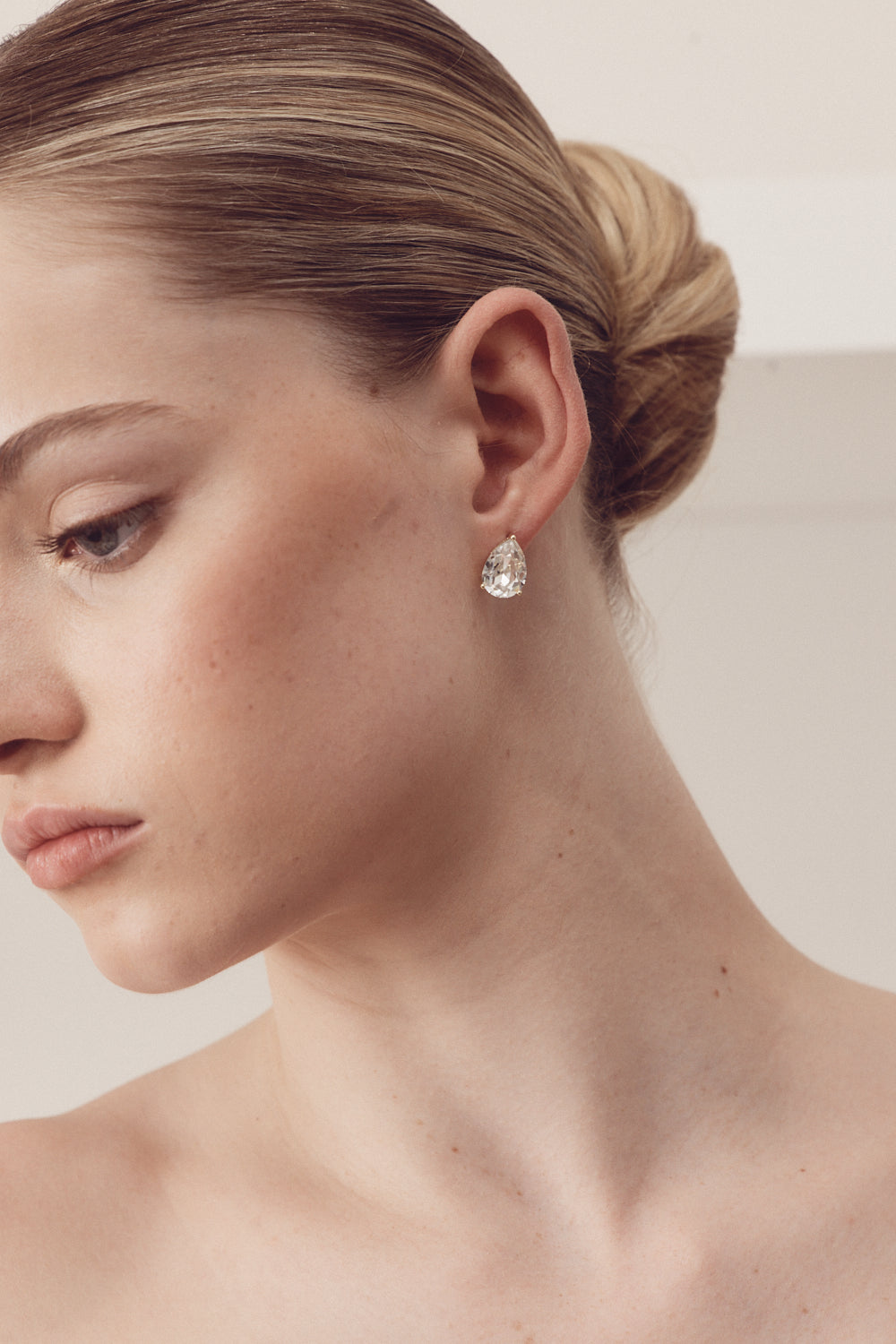 Buy Ruby - Swarovski Crystal Teardrop Stud Clear Crystal Gold Earrings online | The White Collection Australia