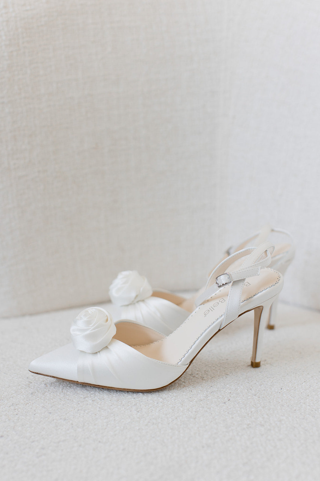 Buy Noelle - Ivory Pointed Toe Rosette Ivory Flower Heels online | The White Collection Australia