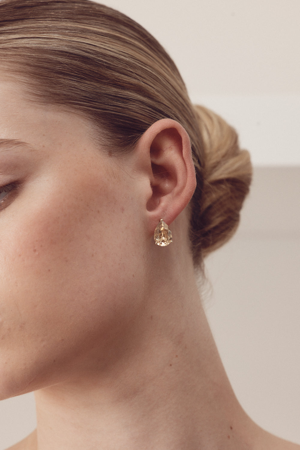 Buy Ruby - Swarovski Crystal Teardrop Stud Clear Crystal Honey Gold Earrings online | The White Collection Australia